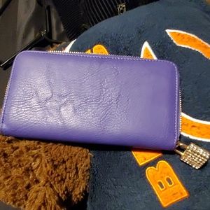 Purple zip around wallet never used